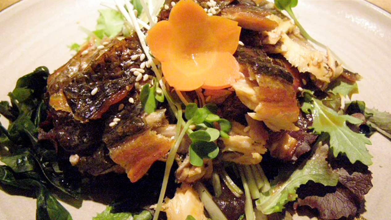 Master Chef Hiroji Obayashi creates with a carrot garnish
